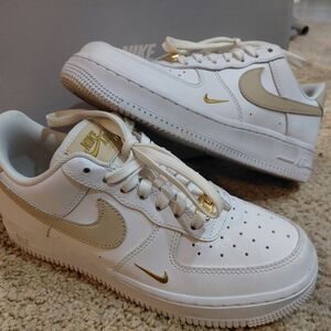 Nike White and Gold Sneakers